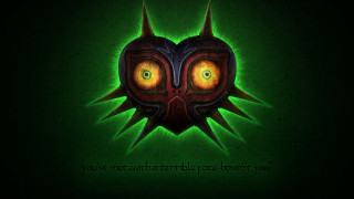 Green black face yellow eyes - a face free wallpaper