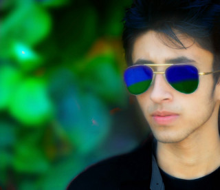 Man sunglasses green blue background - background behind free wallpaper