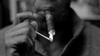 Man smoking cigarette black white 2 - transgressive free wallpaper