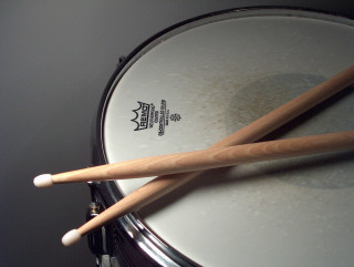 Drums sticks table gray background - focus free wallpaper