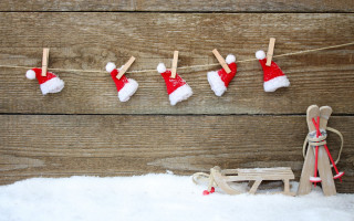 Wooden sled toy santa hat - a clothes line free wallpaper