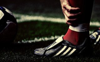 Soccer player football grass closeup - the field free wallpaper