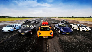 Sports cars parked runway sunny - free cars wallpaper