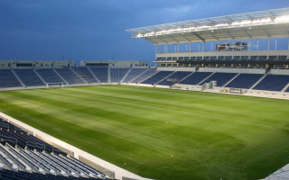 Large empty stadium green field 3 - empty free wallpaper