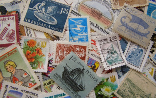 Stamps colorful pile table ship - a table top free wallpaper