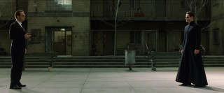 Two men suits courtyard building - step free wallpaper