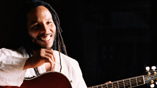 Man dreadlocks guitar smiling camera - chafik charobim free wallpaper