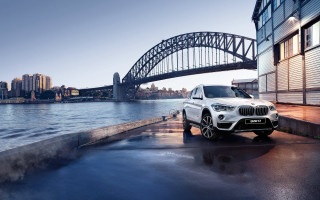 White bmw suv parked bridge - anson maddock free wallpaper