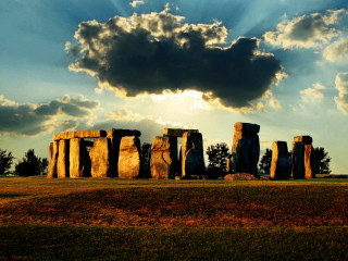 Large stone structure field cloudy - sunbeam free wallpaper
