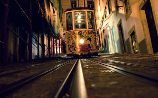 Trolley car narrow alleyway nighttime 2 - a trolley car free wallpaper