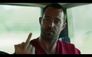 Man red shirt pointing air - charles mahoney free wallpaper