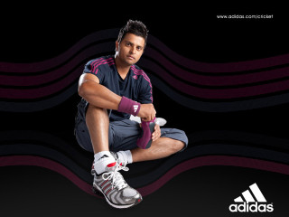 Man sitting ground tennis racket - a tennis racket free wallpaper