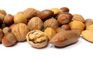 Pile of nuts with one - product photo free wallpaper for desktop