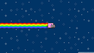 Computer game rainbow cat top - a rainbow in the middle of it free wallpaper