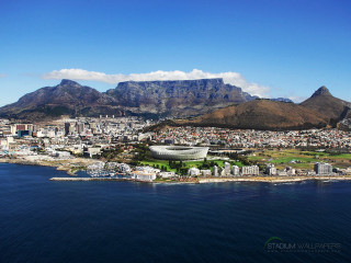 City mountains water large building - breyten breytenbach free wallpaper