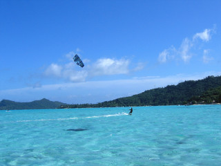 Parasailing ocean blue sky clouds - derek chittock free wallpaper for desktop