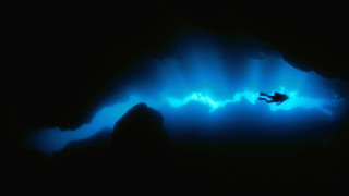 Swimming cave blue light man 2 - blue light free wallpaper