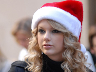 Woman santa hat serious look - cam sykes free wallpaper