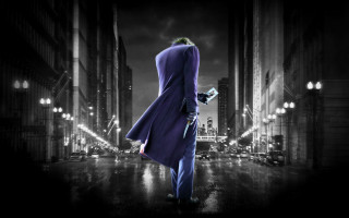 Man purple suit hat rain - a cityscape in the background free wallpaper