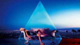 Woman couch blue triangle city - a blue triangle free wallpaper