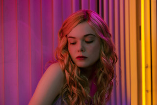 Woman blonde hair purple wall - a purple wall free wallpaper