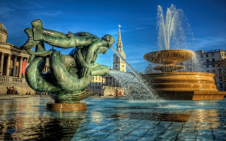 Fountain mermaid statue building spire - classical realism free wallpaper
