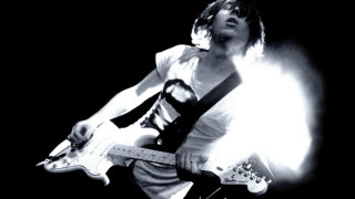 Man playing guitar light neck - black tie free wallpaper