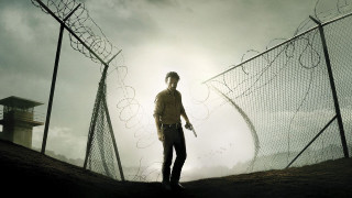 Man holding gun fence barbed 2 - darrell riche free wallpaper