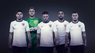 Soccer team men uniforms holding - their other hand free wallpaper