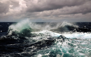 Large wave breaking ocean cloudy 3 - the ocean under a cloudy sky free wallpaper