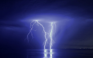 Lightning strikes water night dark - thunderstorm free wallpaper