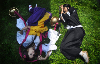 Couple laying lush green field 2 - cosplay free wallpaper