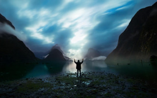 Beach person arms up mountains - david boyd free wallpaper