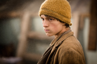 Young man brown hat serious - a young man free wallpaper