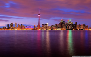 City skyline blue sky purple - vibrant colour free wallpaper