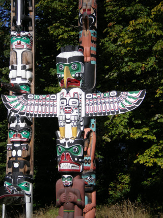 Totem statue forest trees bushes - sculpture free wallpaper