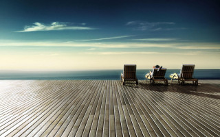 Two people sitting chairs deck - a deck free wallpaper