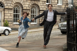 Man woman running hand in - movie still free wallpaper