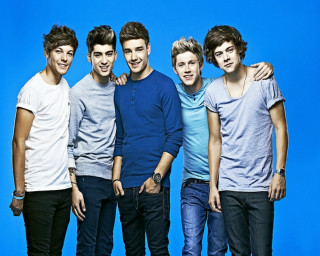 Young men group blue background - a blue background behind them free wallpaper
