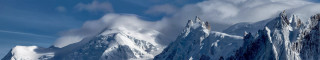 Snowy mountain blue sky clouds 13 - snow under a blue sky free wallpaper