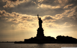 Liberty silhouette cloudy water night - a statue of liberty free wallpaper