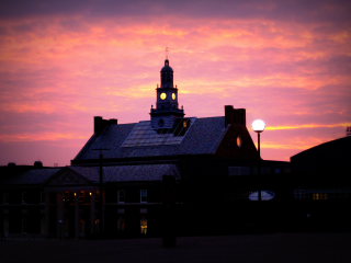Building clock tower pink purple - sky in the background free wallpaper