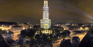 Tall building colorful light night - cerith wyn evans free wallpaper