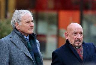 Two men standing street corner - a street corner free wallpaper