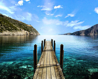 Wooden dock ocean mountains sunny - clear free wallpaper for desktop