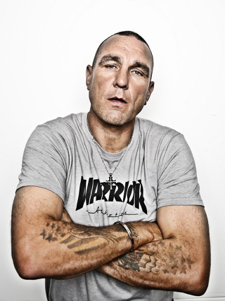 Tattooed man posing arms crossed - tattoo free wallpaper for mobile