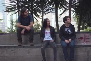 Three people sitting on ledge - three person free wallpaper