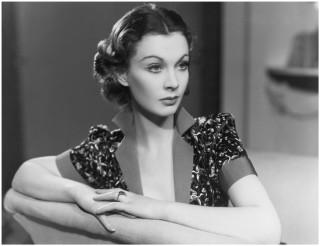 Woman arms crossed sitting couch - vintage free wallpaper