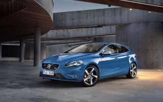 Blue volvo car parking garage - concrete free wallpaper