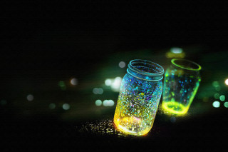Jars colored lights dark tabletop - firefly free wallpaper